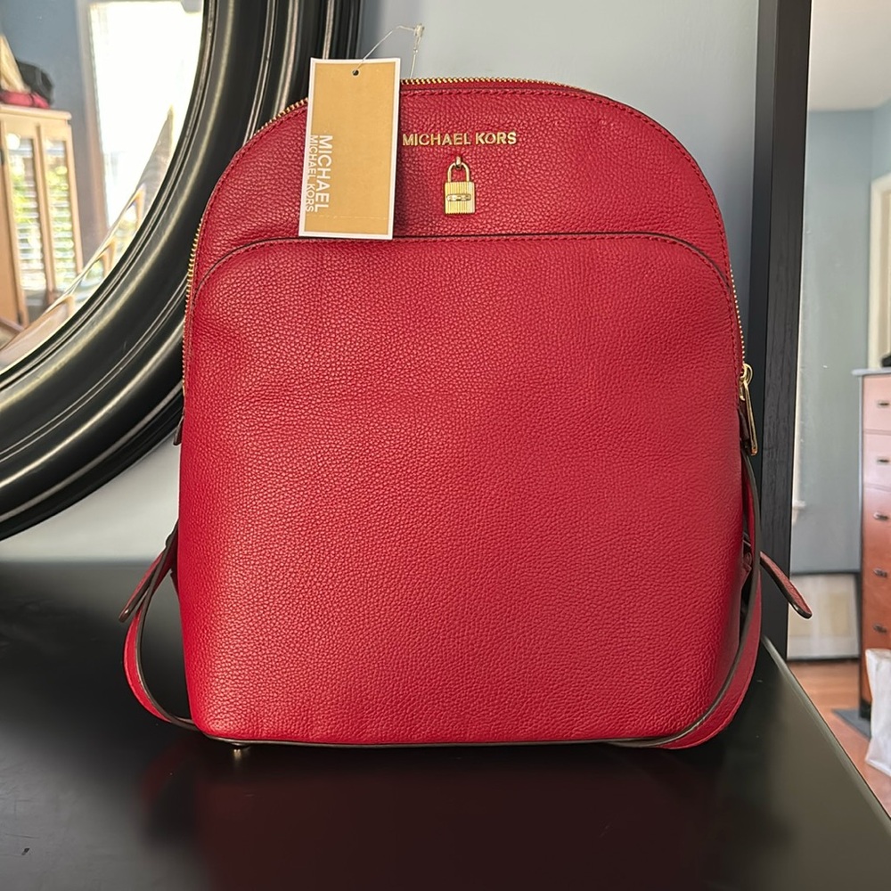 Brand new with tags. Red backpack.